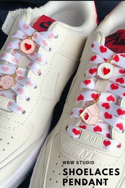 shoelace charms, shoe charms, sneaker charms, shoelace pendants, shoe accessories, lace charms, new arrival, product launch, lifestyle, editorial, playful, warm, neutral, red, pink, valentine's day